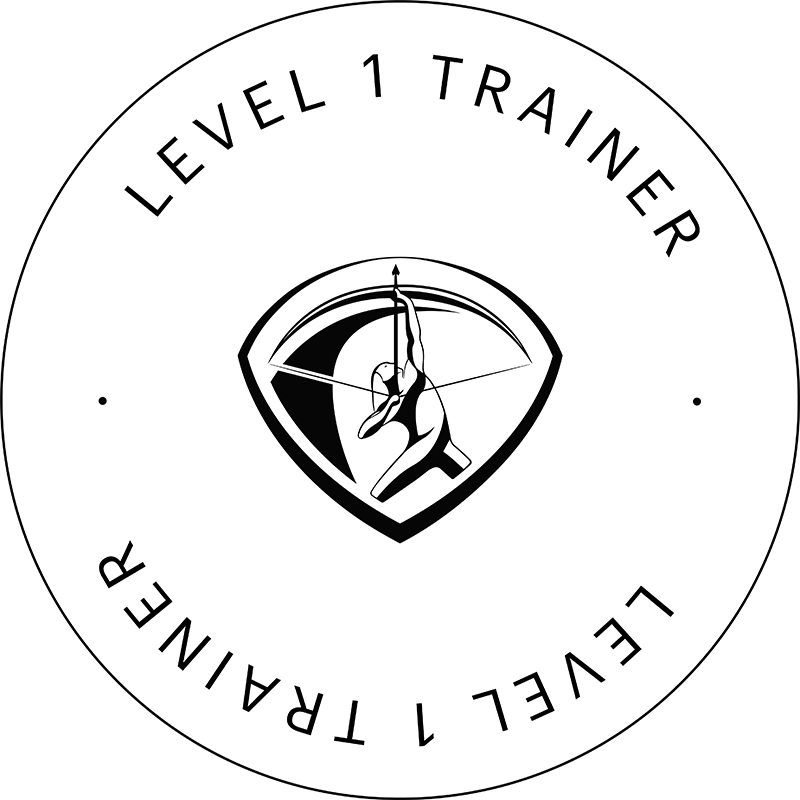 lagree-method-level-1-trainer-certification-badge-tight-dallas. A circular Level 1 Trainer certification badge featuring the Lagree Method shield emblem, with the text repeating around the circle.